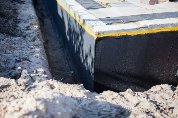 Professional Exterior Waterproofing technician working in Lakeland, GA